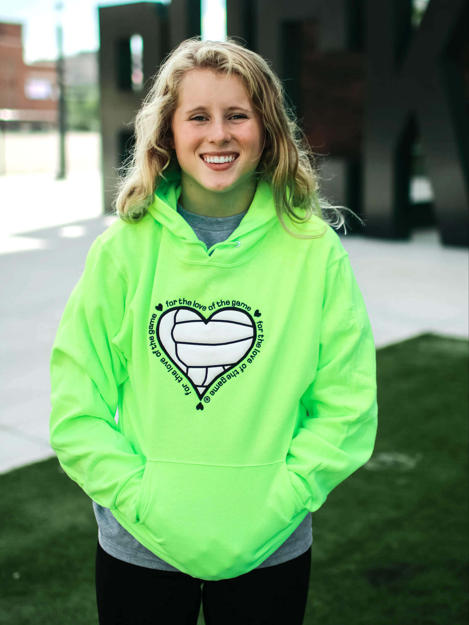For the Love of the Game with Volleyball detail on Safety Green hoodie